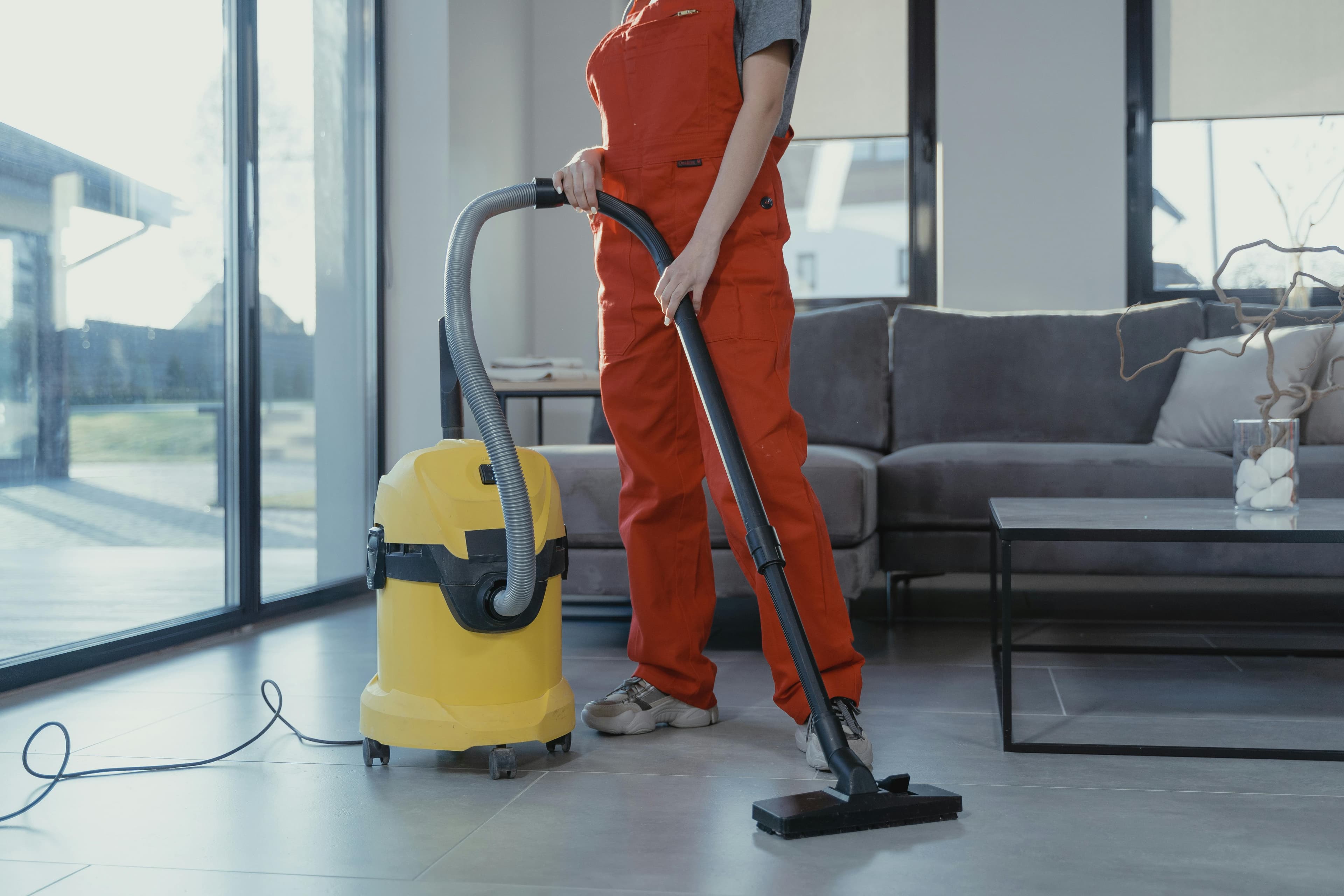 Janitorial cleaning professional servicing a commercial building